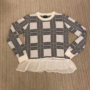 Black and white sweater with chiffon at bottom